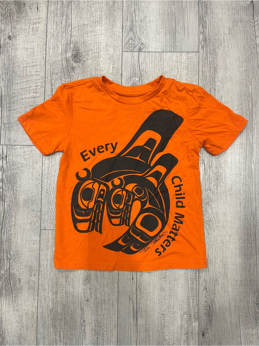 5 for $10 Indigenous Orange Kids Tee with Black Indigenous Art Graphic
